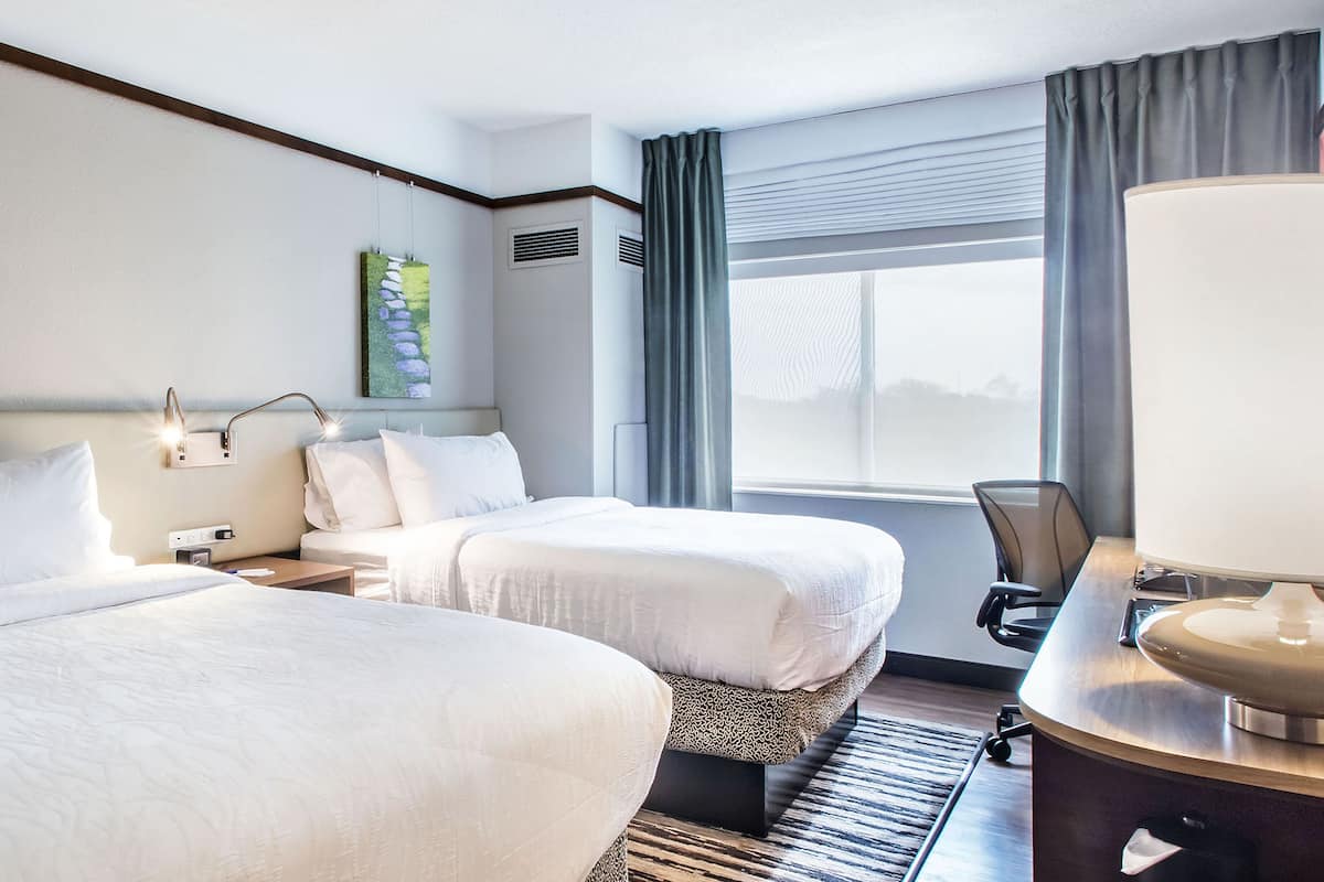 Room, 2 Queen Beds | Desk, laptop workspace, blackout drapes, free cribs/infant beds