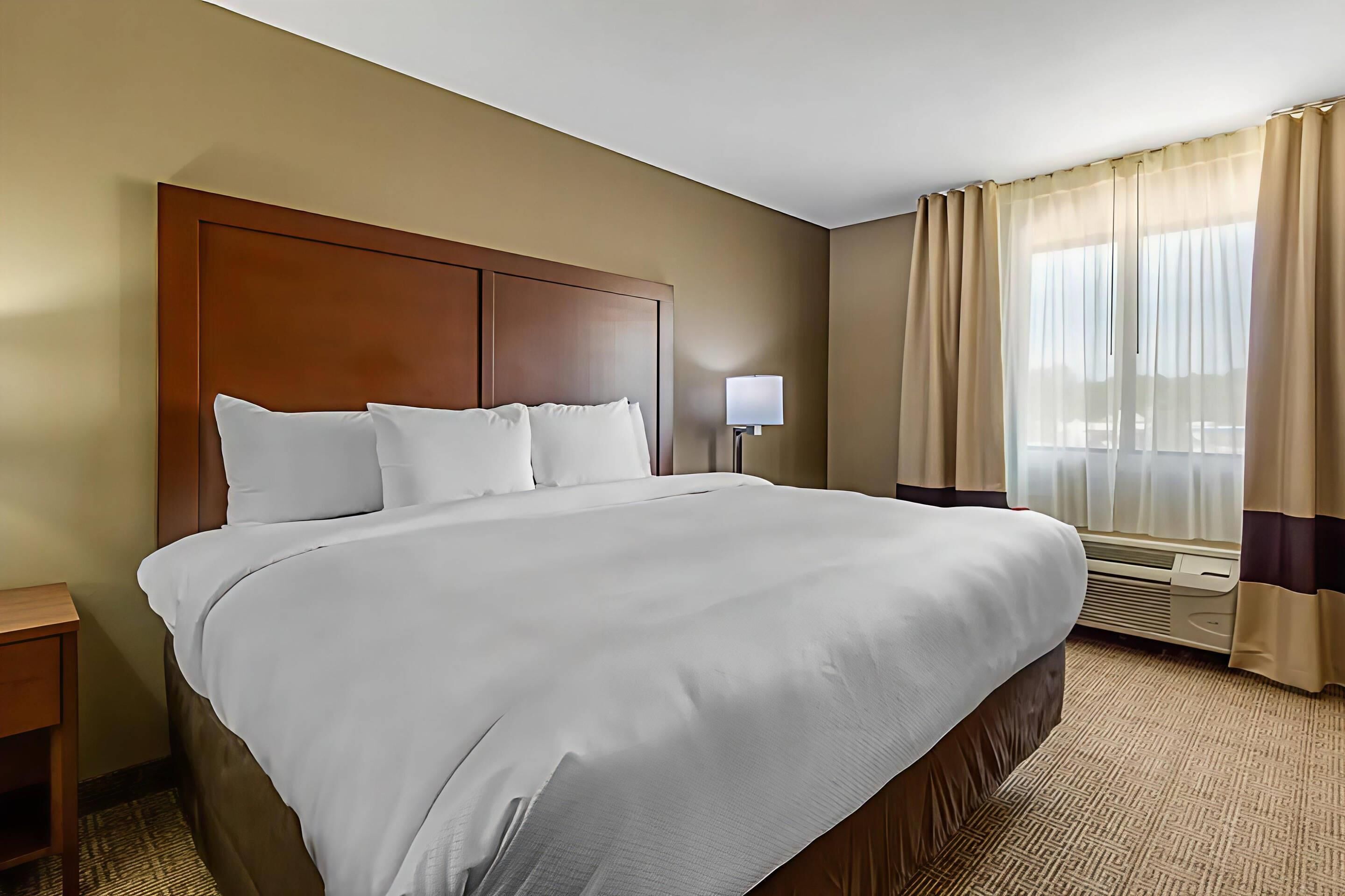 Premium bedding, pillow-top beds, desk, blackout curtains