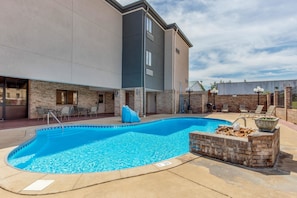 Seasonal outdoor pool, pool loungers