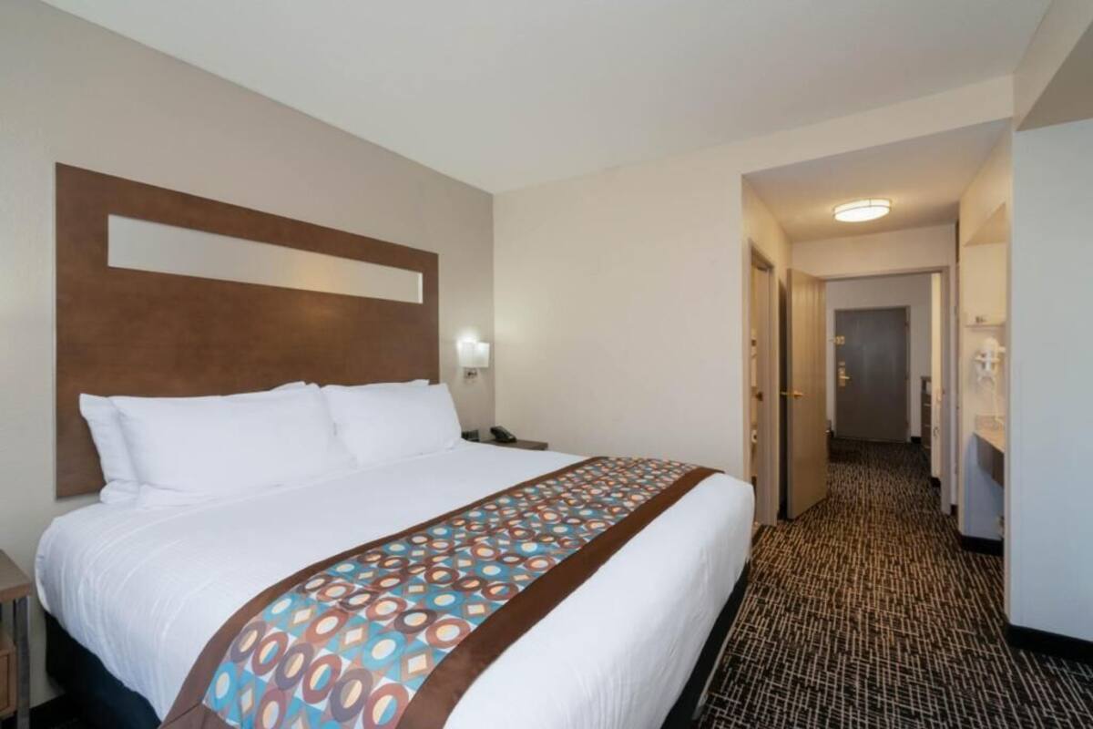 Premium bedding, pillowtop beds, desk, blackout drapes