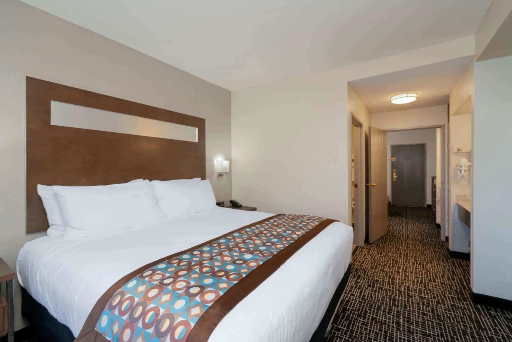 Premium bedding, pillowtop beds, desk, blackout drapes