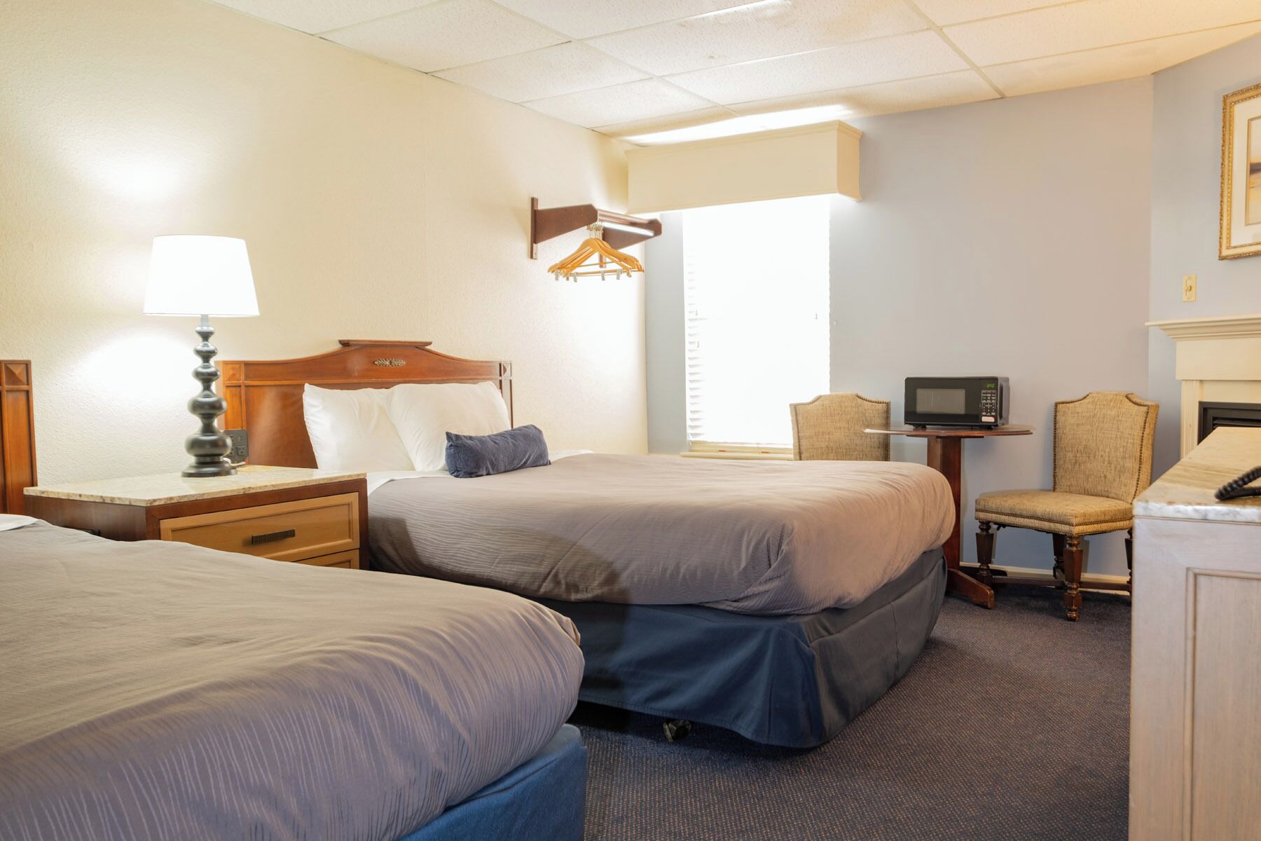 Deluxe Room, 2 Queen Beds, Fireplace | Blackout drapes, iron/ironing board, free WiFi, bed sheets