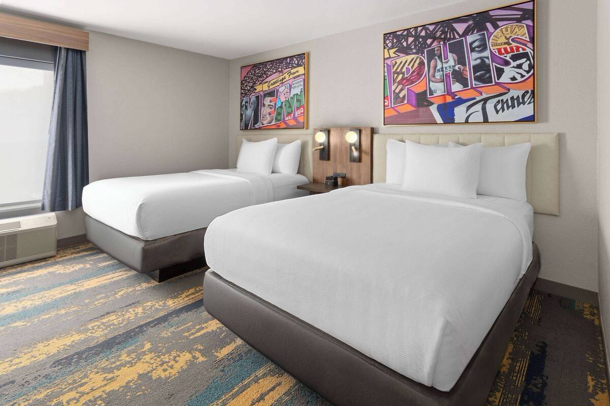 Premium bedding, memory foam beds, in-room safe, desk