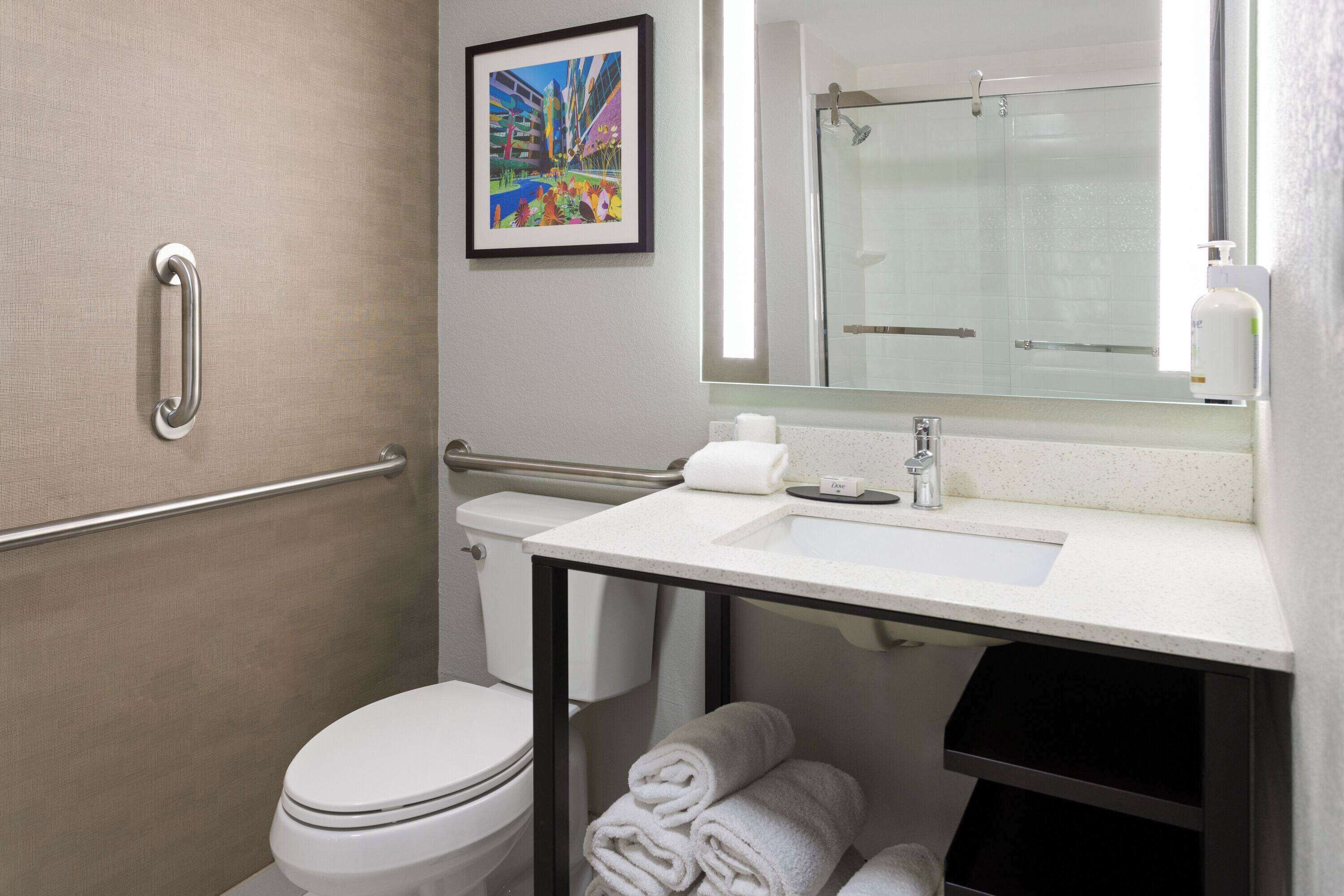 hydromassage showerhead, free toiletries, hair dryer, towels