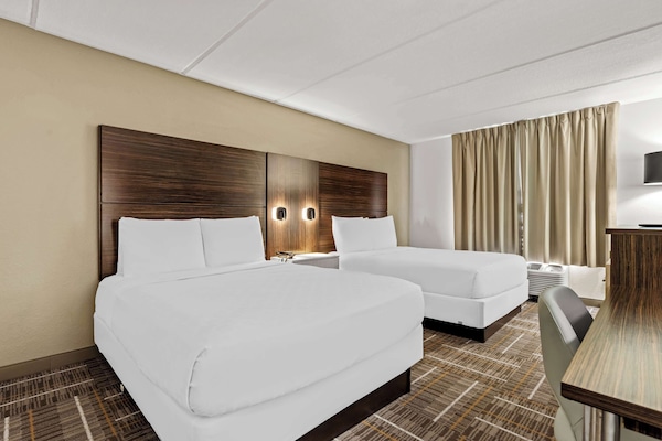 Room, 2 Queen Beds | Laptop workspace, blackout drapes, iron/ironing board, cribs/infant beds