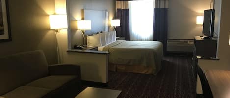 Desk, laptop workspace, iron/ironing board, free cribs/infant beds