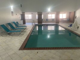 Indoor pool, open 10:00 AM to 10:00 PM, sun loungers