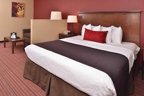Suite, 1 King Bed, Non Smoking, Jetted Tub (with Sofabed) | Desk, blackout curtains, iron/ironing board, rollaway beds