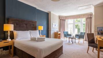 1 dormitori, caixa forta a l'habitació i mobiliari individual