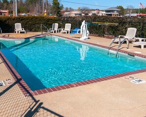 Seasonal outdoor pool, pool umbrellas, pool loungers