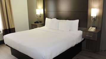 Suite, 1 King Bed, Non Smoking | Pillow-top beds, desk, iron/ironing board, free cots/infant beds