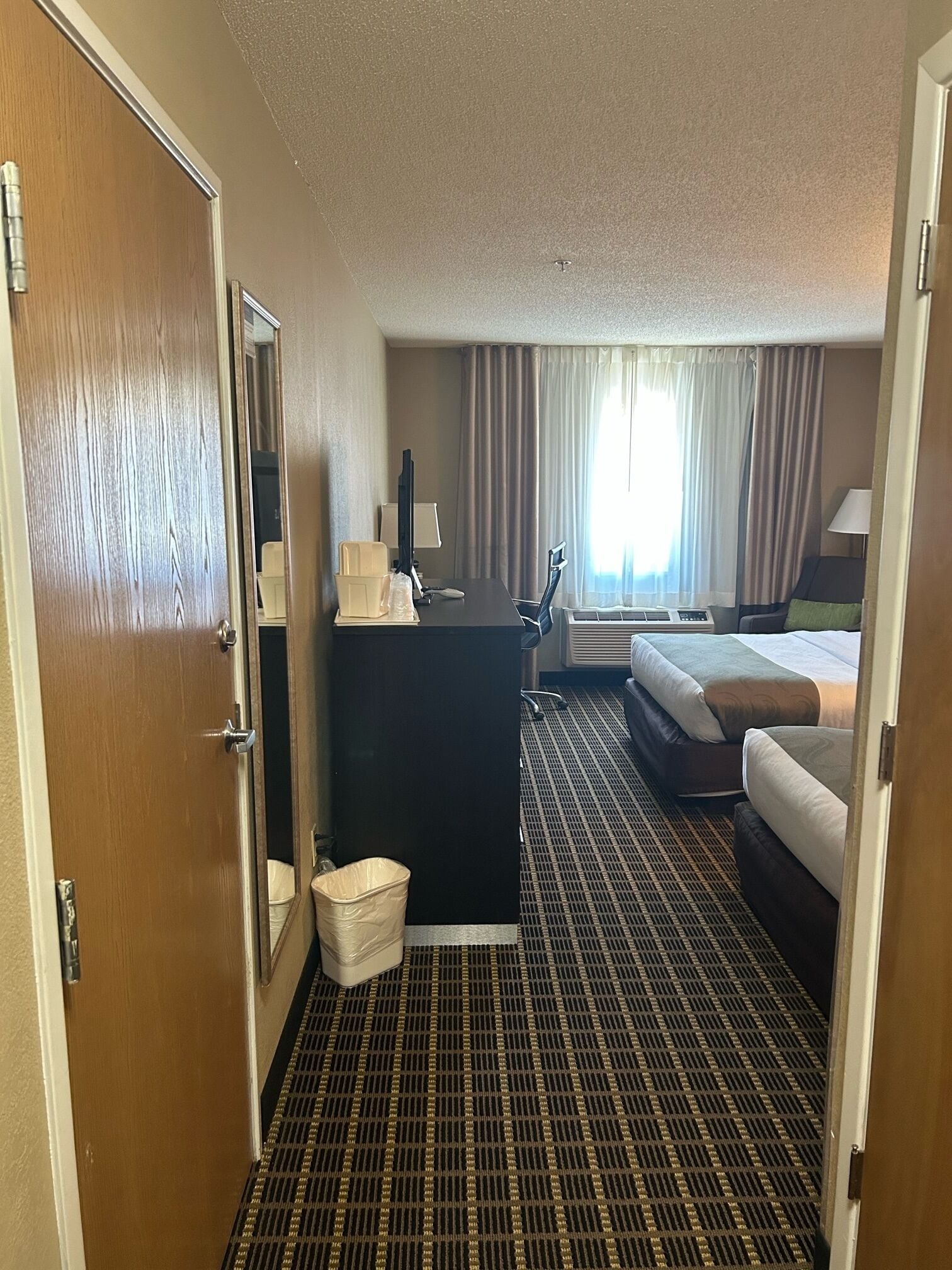 desk, blackout curtains, iron/ironing board, free cots/infant beds