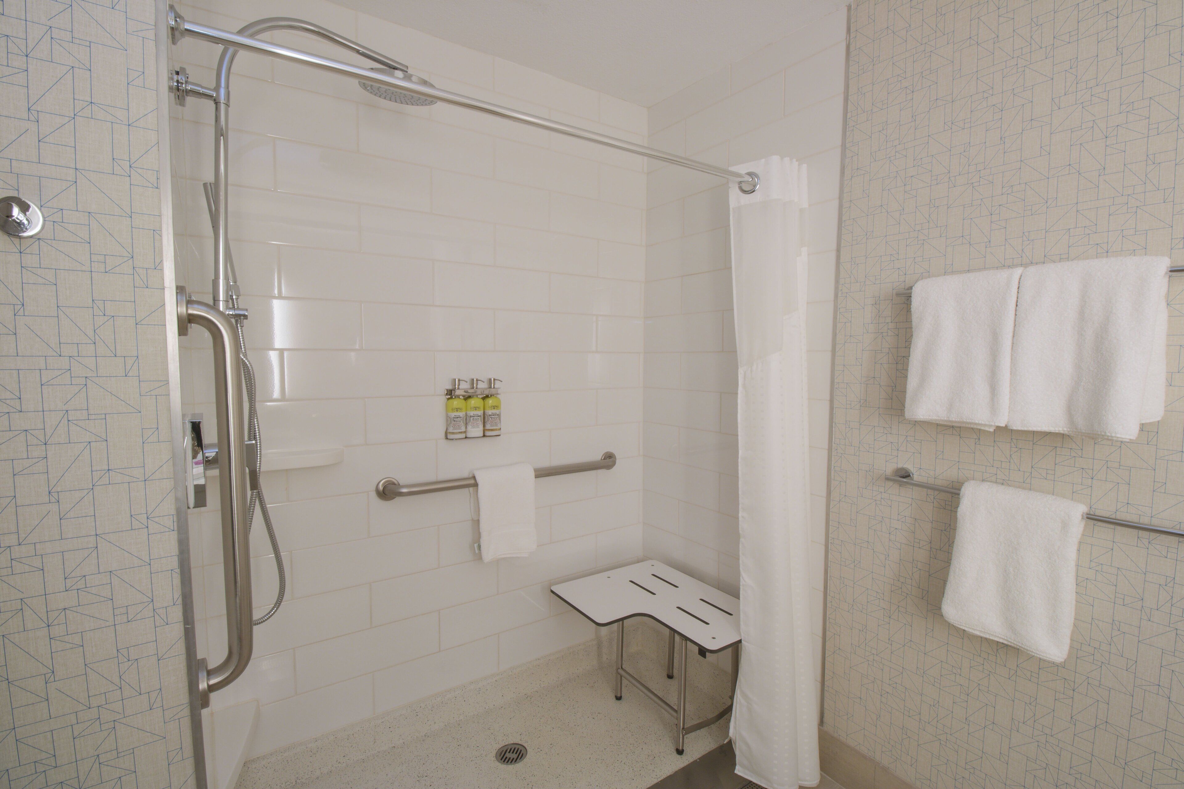 combined shower/bathtub, free toiletries, hair dryer, towels