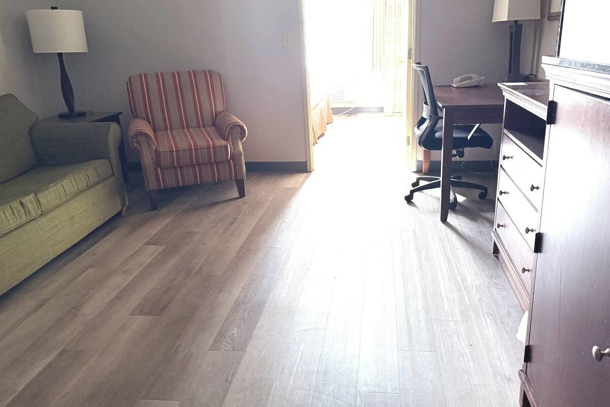 Comfort Suite, 1 King Bed with Sofa bed | Living area | 32-inch flat-screen TV with satellite channels, TV