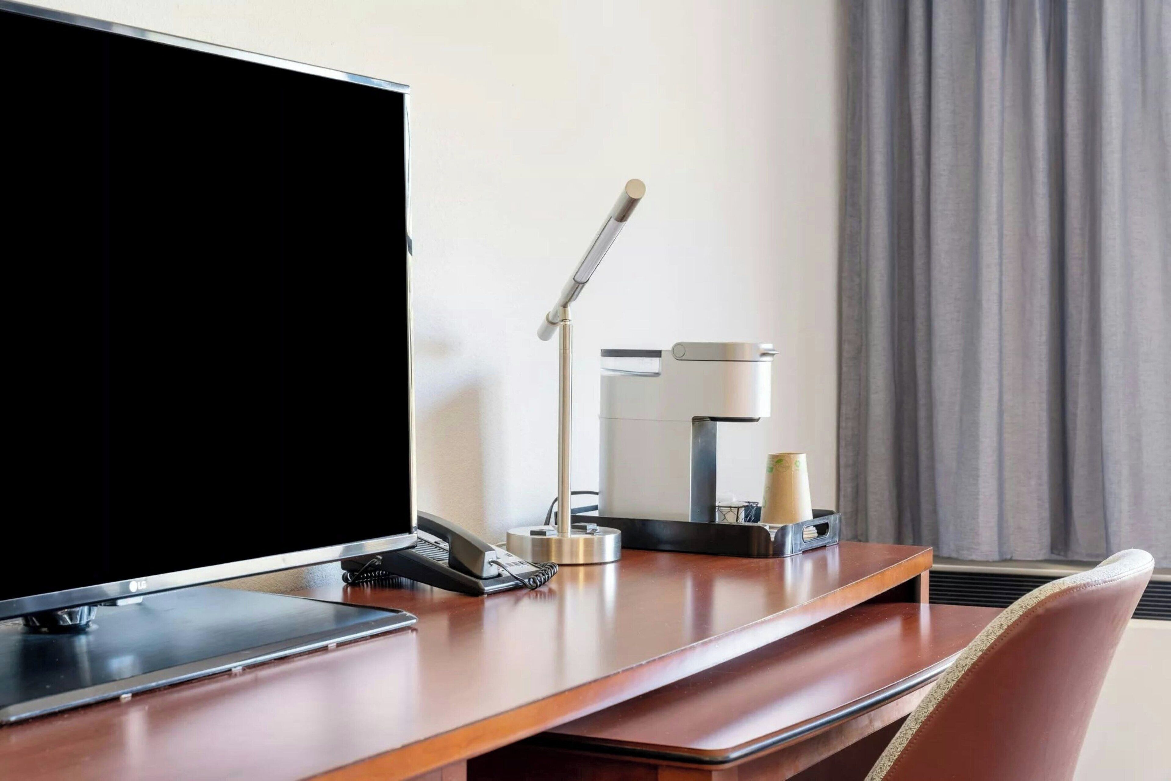 premium bedding, down duvets, desk, laptop workspace