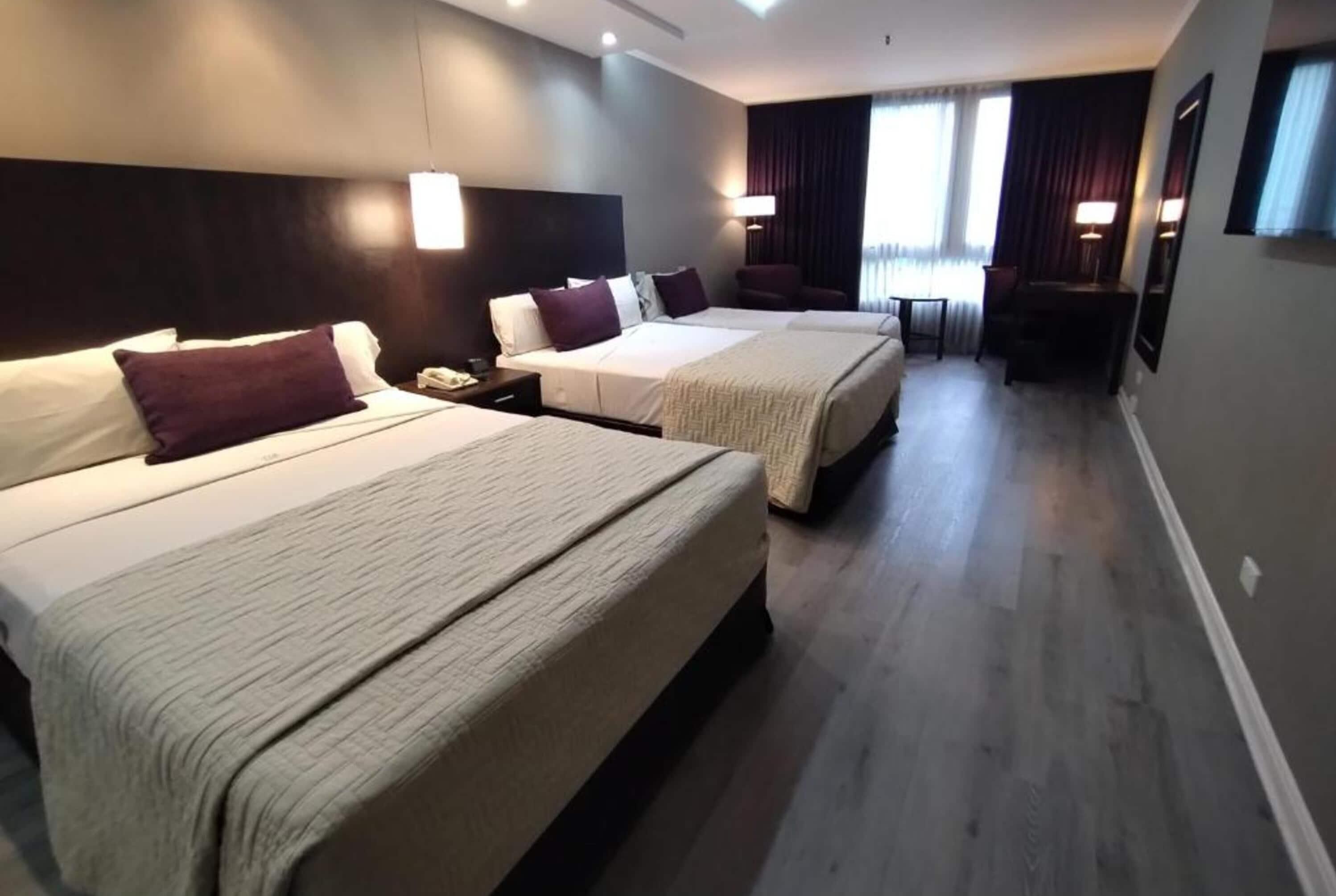 Superior Triple Room | Premium bedding, down duvets, pillow-top beds, minibar