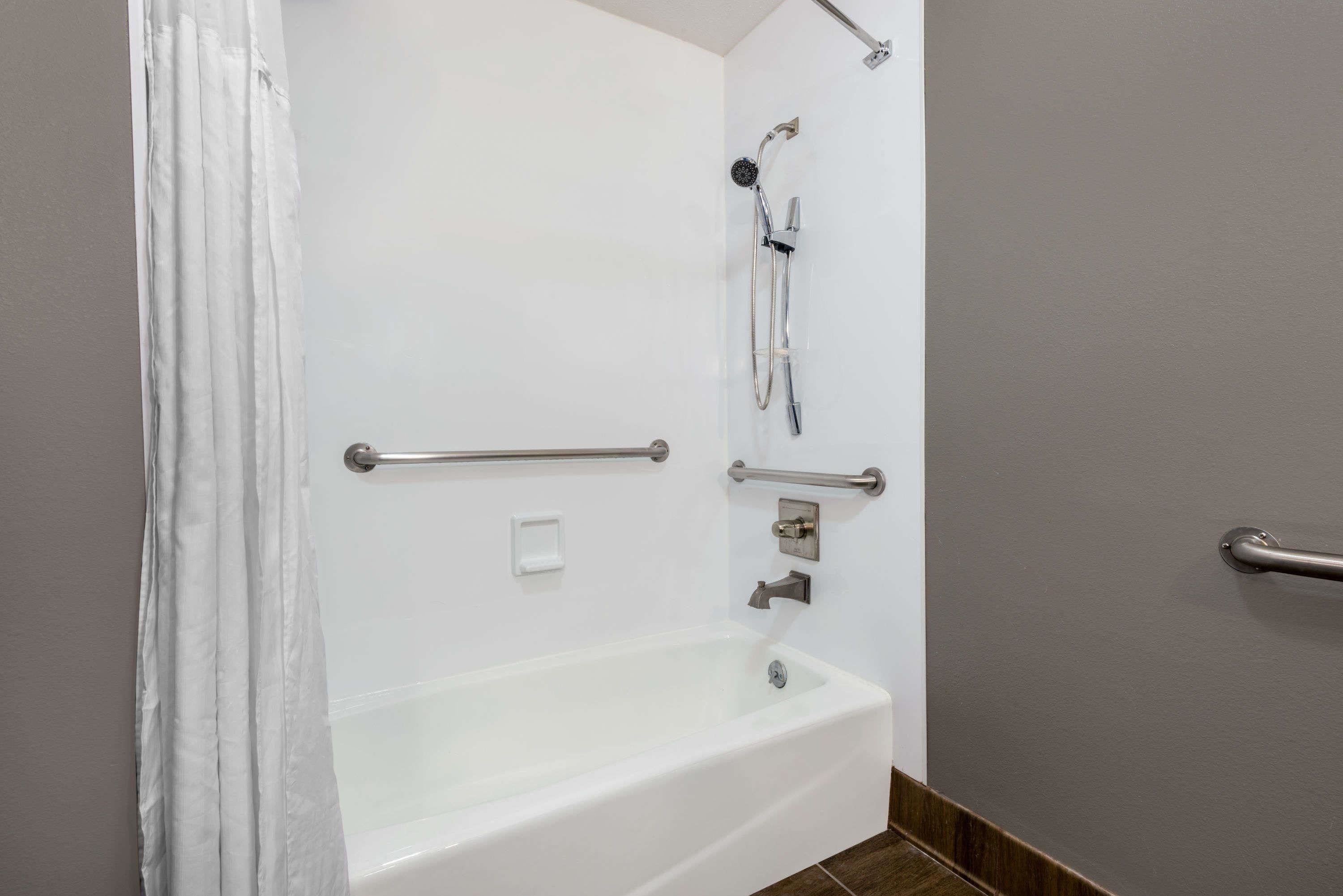 combined shower/bathtub, eco-friendly toiletries, hair dryer, towels