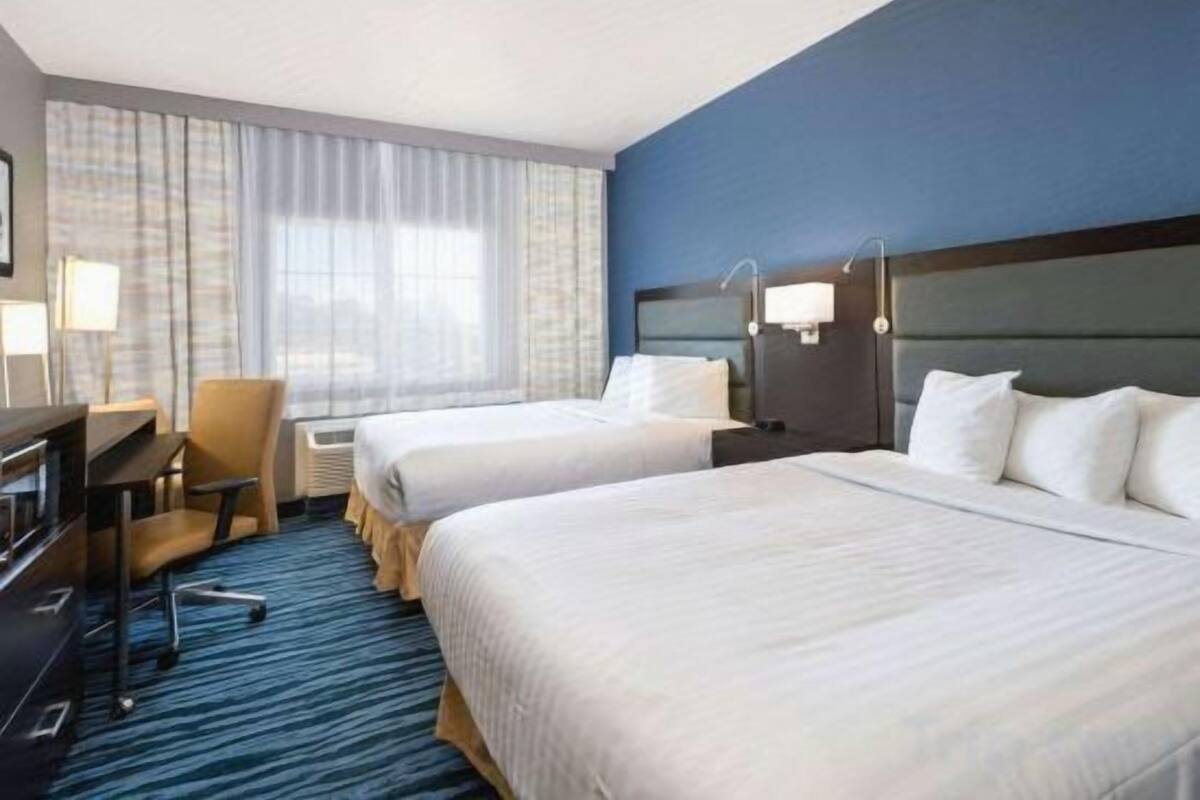 Premium bedding, pillow-top beds, in-room safe, desk