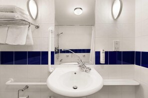 Combined shower/tub, eco-friendly toiletries, hair dryer, towels