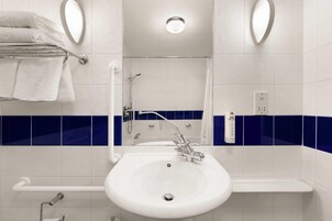 Combined shower/tub, eco-friendly toiletries, hair dryer, towels