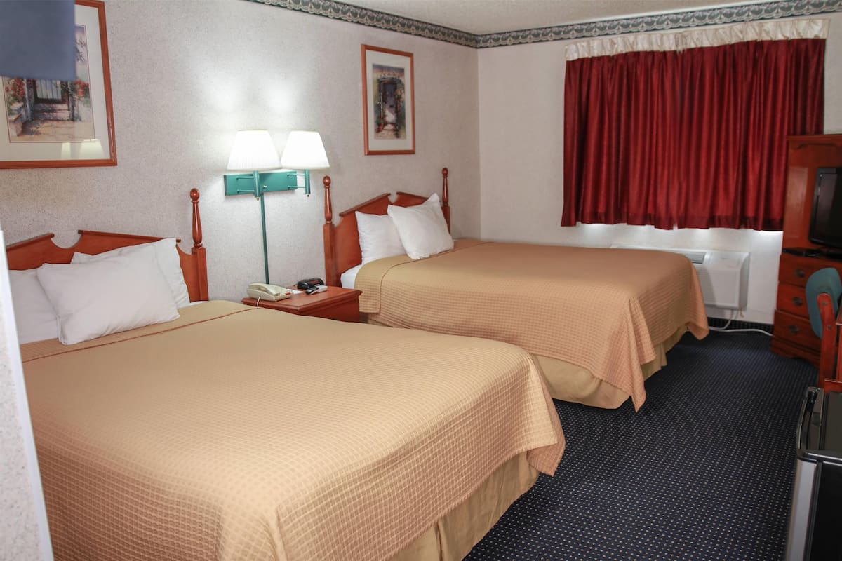 Room, 2 Queen Beds, Non Smoking | Desk, laptop workspace, blackout drapes, iron/ironing board