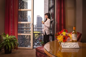 Suite, 1 King Bed with Sofa bed, Balcony | Living room | 42-inch flat-screen TV with cable channels, TV, DVD player - Hotel Giraffe by Library Hotel Collection (New York)