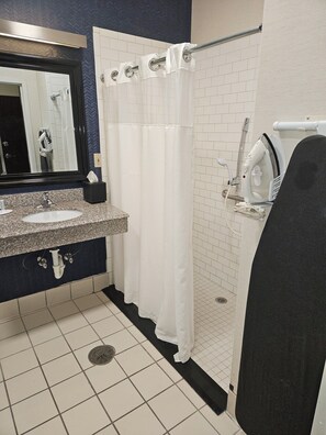 Room, 1 King Bed (Mobility Accessible, Tub) | Bathroom | Combined shower/tub, hair dryer, towels, soap
