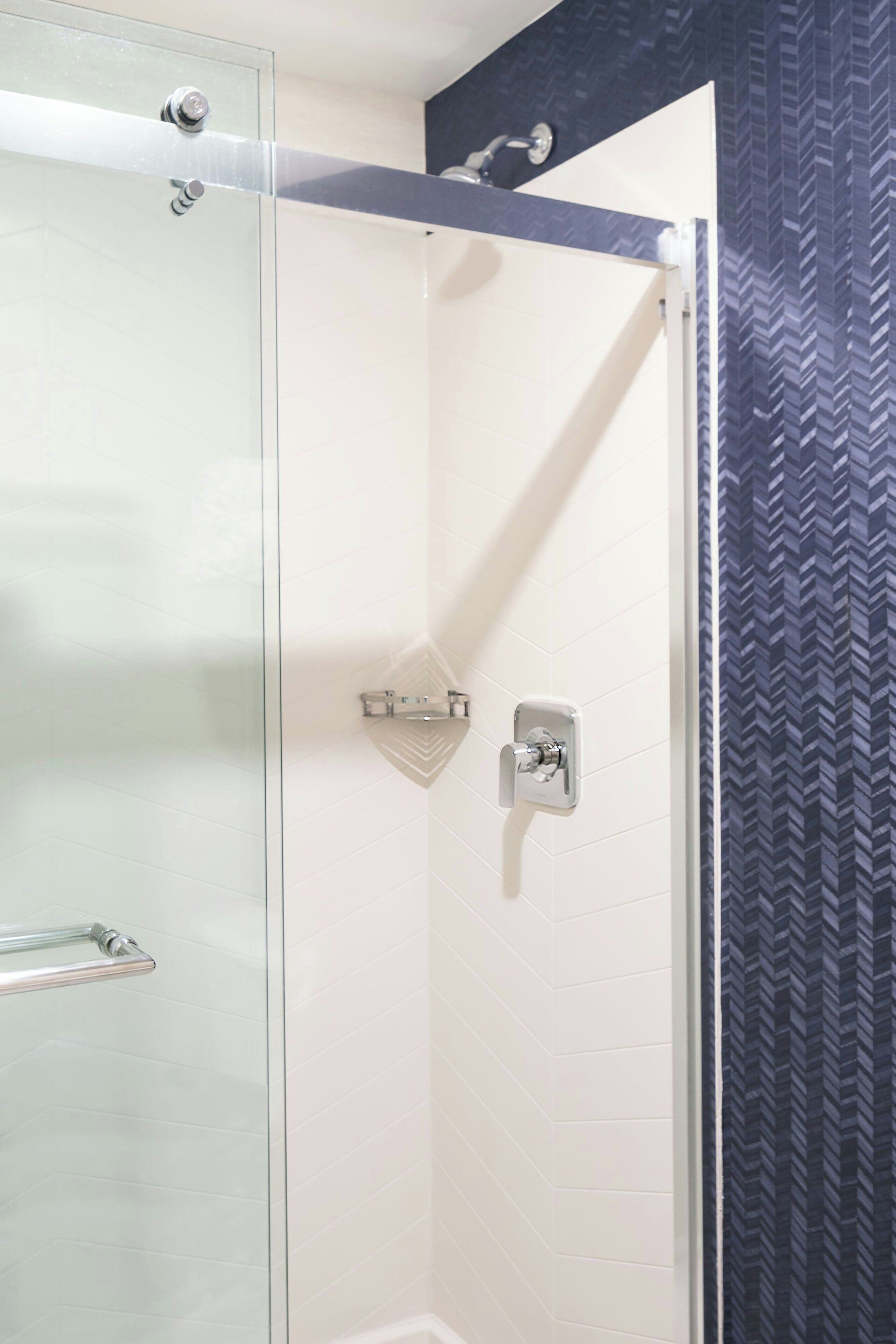 combined shower/bathtub, hair dryer, towels, soap