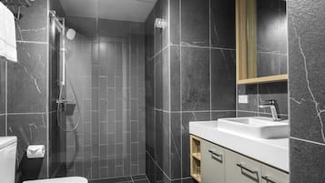 Shower, free toiletries, hair dryer, towels