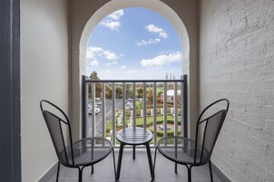 Suite, 1 King Bed, Balcony | Garden view