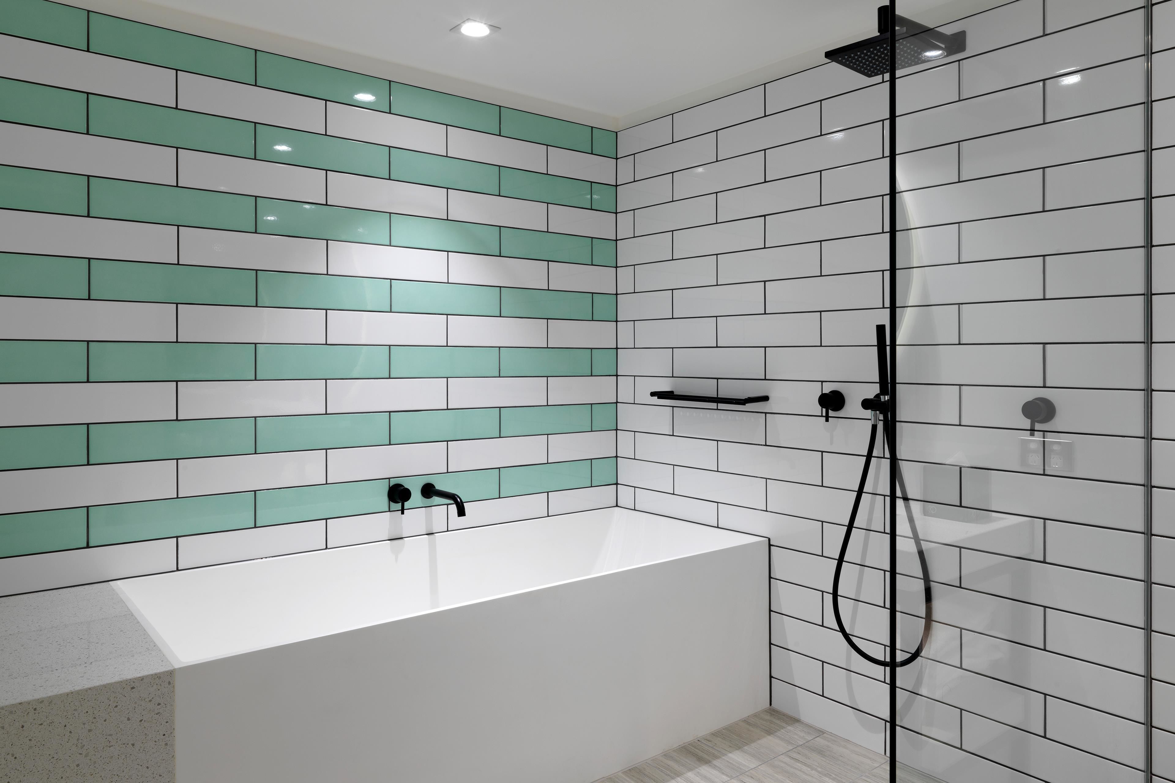 qt atrium suite | bathroom | separate bathtub and shower, designer toiletries, hair dryer, bathrobes