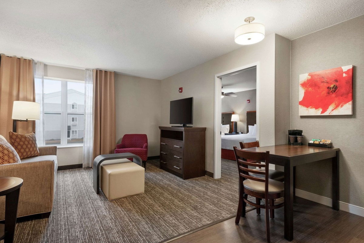 Blackout drapes, iron/ironing board, cribs (free), WiFi (free)