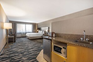 Suite, 1 King Bed, Non Smoking, Hot Tub | Individually decorated, individually furnished, desk, laptop workspace