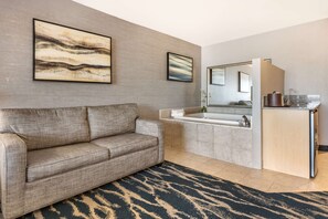 Suite, 1 cama de matrimonio grande, no fumadores, bañera de hidromasaje | Decoración individual, mobiliario individual, escritorio