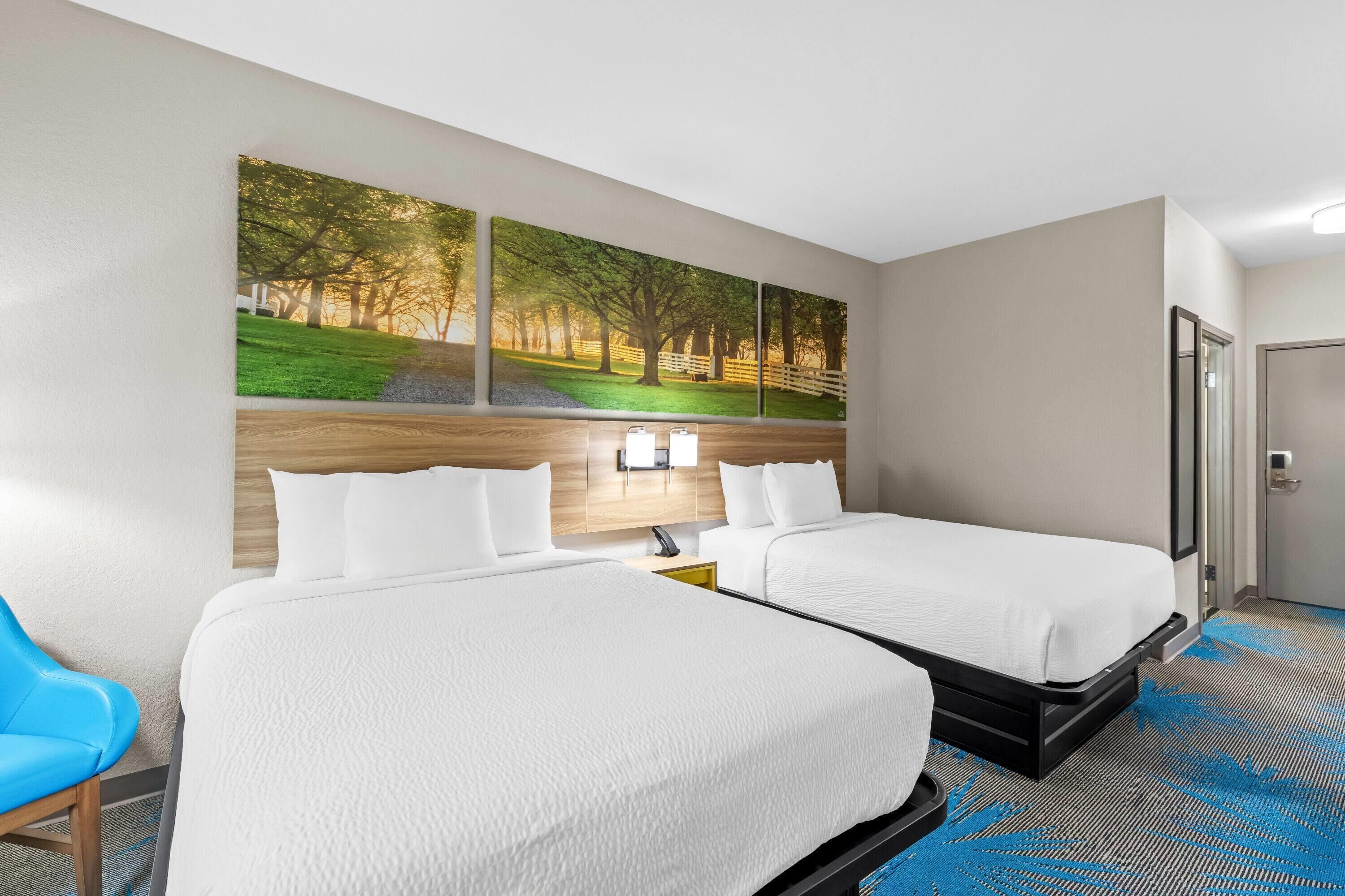 Room, 2 Queen Beds, Non Smoking | Desk, blackout drapes, iron/ironing board, free cribs/infant beds