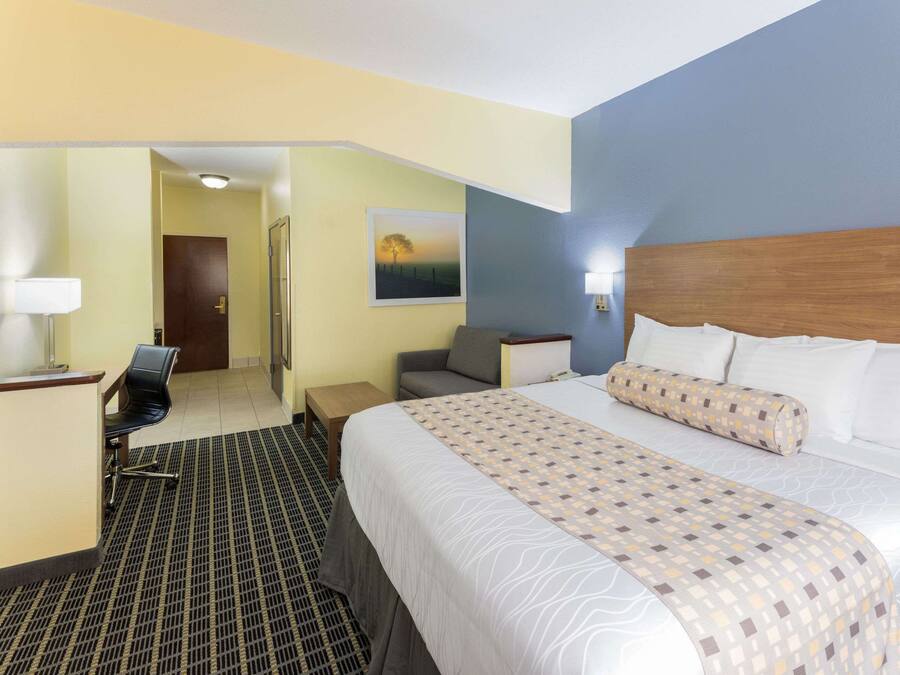 Desk, blackout drapes, iron/ironing board, free cribs/infant beds