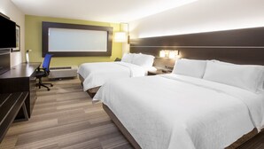 A hotel room with two beds, a desk, a chair, a TV, and a large window. - Holiday Inn Express Fairfield by IHG (Fairfield)