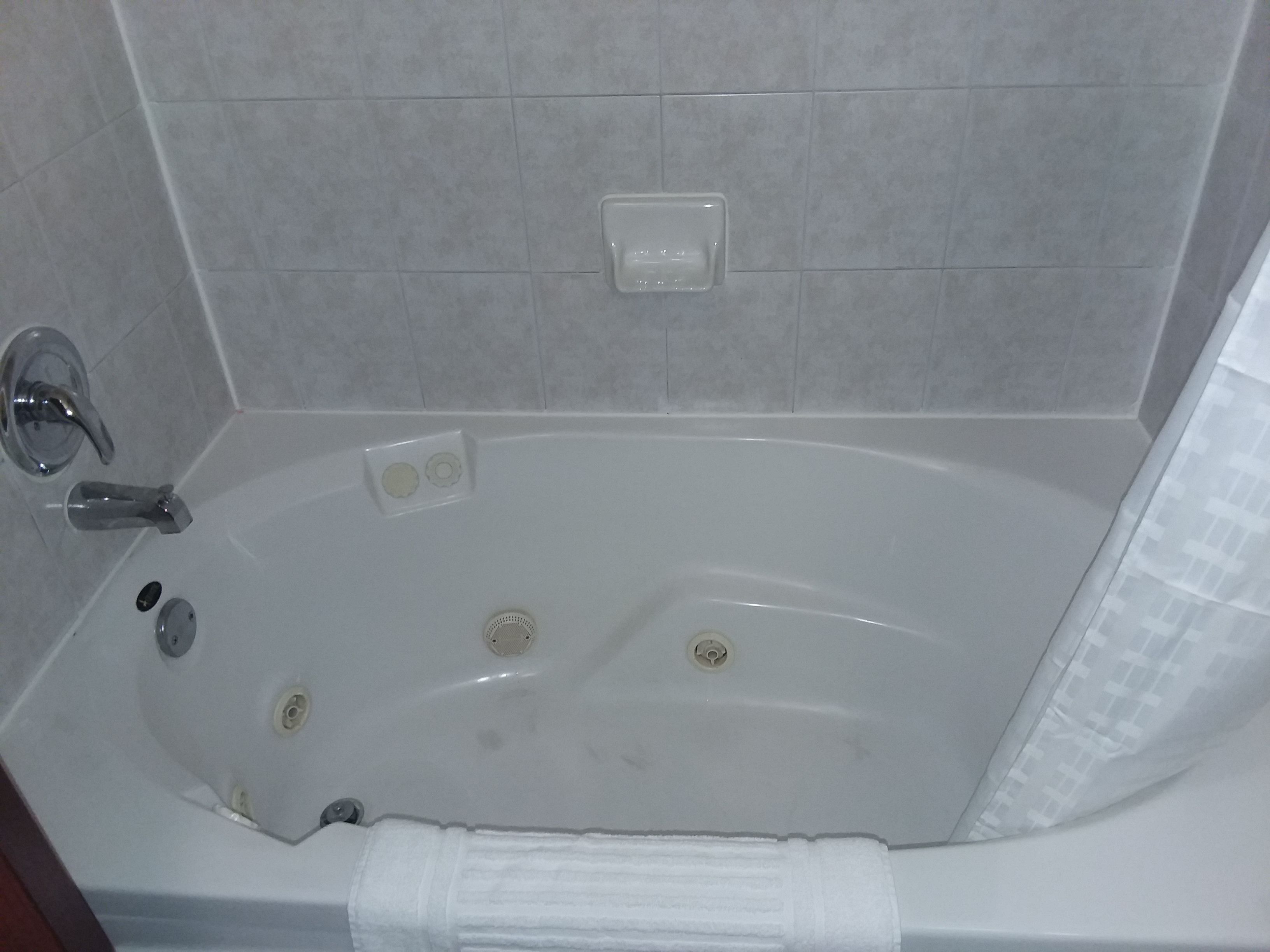 suite, 1 king bed, non smoking, jetted tub | jetted bathtub