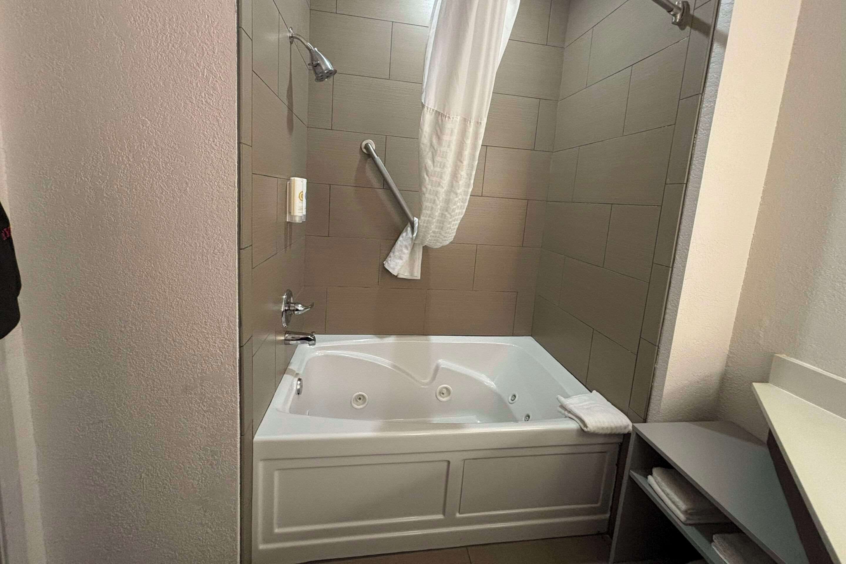 suite, 1 king bed, non smoking, jetted tub | premium bedding, pillow-top beds, in-room safe, individually furnished