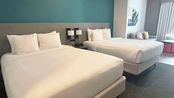 Suite, varias camas | Ropa de cama de alta calidad y camas con pillow-top