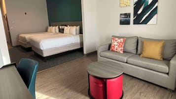 Suite, varias camas | Ropa de cama de alta calidad y colchones con acolchado adicional