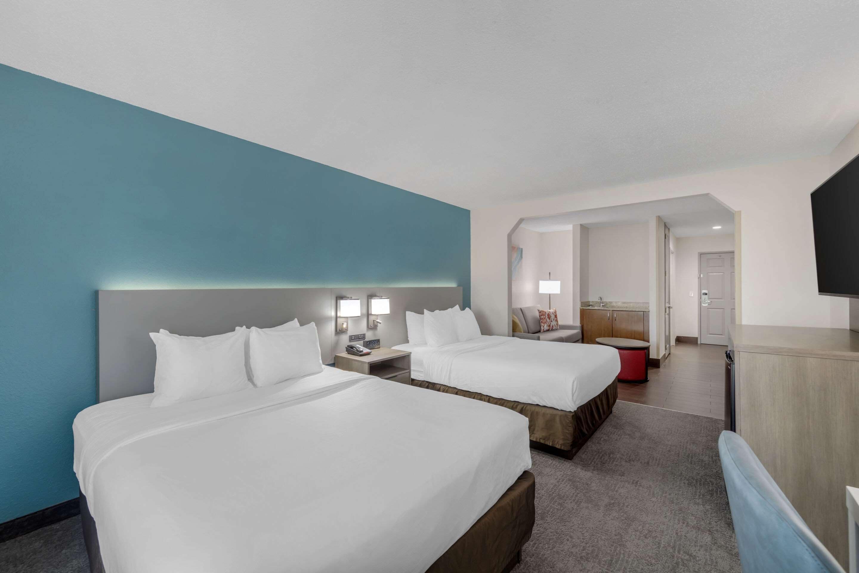 desk, laptop workspace, blackout curtains, iron/ironing board