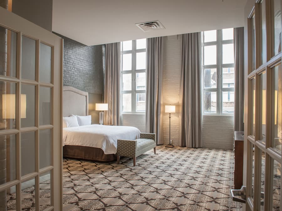 Suite, king bed, sofa bed, kitchen, whirlpool tub | Hypo-allergenic bedding, in-room safe, blackout drapes