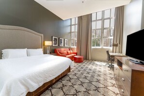 Studio suite, king bed, sofa bed, kitchen, whirlpool tub | Living area | 42-inch flat-screen TV with cable channels, TV, iPod dock - Hampton Inn & Suites New Orleans Convention Center (New Orleans)