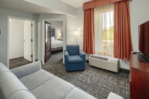 Suite, 1 King Bed, Non Smoking | Hypo-allergenic bedding, minibar, desk, laptop workspace