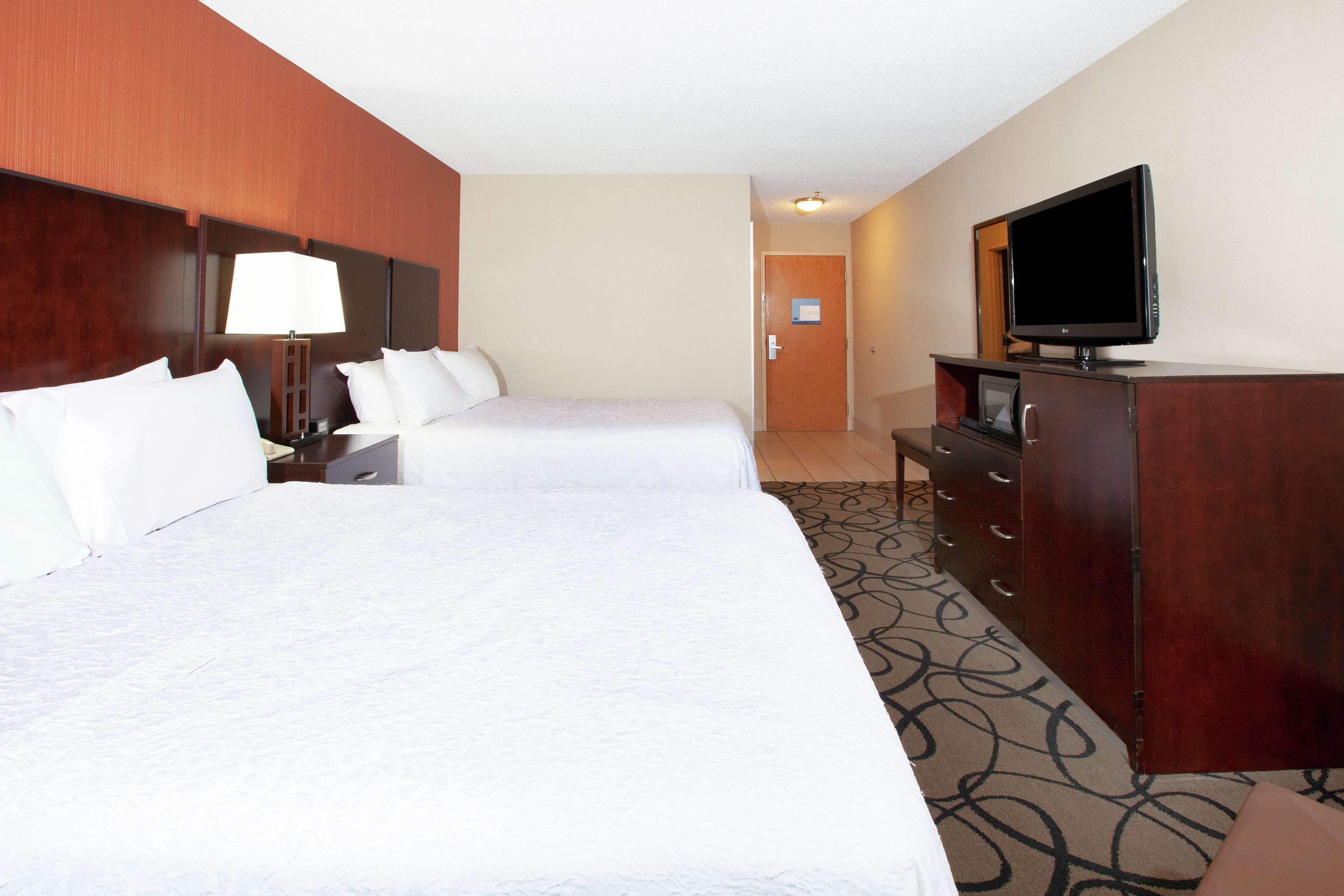 standard room, 2 queen beds, non smoking, refrigerator & microwave | iron/ironing board, free cots/infant beds, free wifi, bed sheets