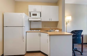 Studio, 1 Queen Bed, Non Smoking | Private kitchen | Full-sized fridge, microwave, stovetop, coffee/tea maker