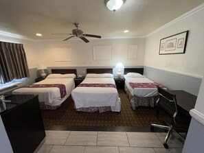 Deluxe, 2 Queen or 2 Double and 1 single | Desk, rollaway beds, WiFi, bed sheets