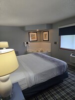 Suite, 1 King Bed, Non Smoking | Hypo-allergenic bedding, soundproofing, iron/ironing board