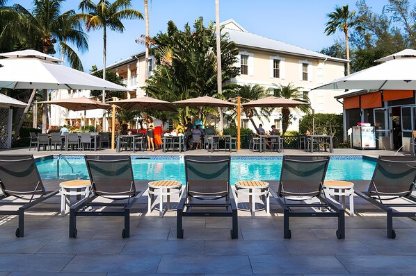 Outdoor pool, pool umbrellas, sun loungers